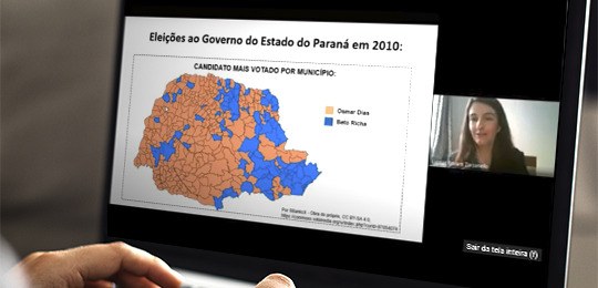 Imagem de um notebook exibindo a acadêmica Liamar Bonatti Zorzanello fazendo sua apresentação no...