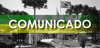 Banner com o título "Comunicado", em letras brancas, sobre uma faixa horizontal verde e amarela....