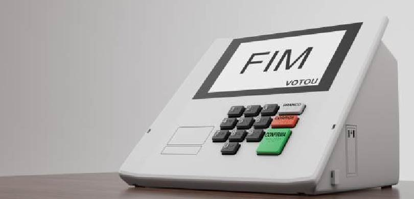 Uma urna eletrônica, modelo 2022, com as palavras fim e votou na tela.