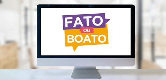 Foto da tela de um computador. Na tela, o título: "fato ou boato", nas cores roxa, laranja, bran...