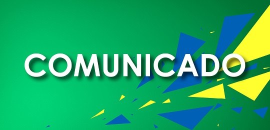 Banner de fundo verde onde se lê e, fonte branca a palavra “Comunicado”. À direita, há triângulo...
