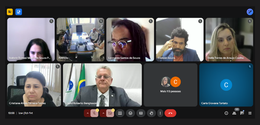 Print de tela de uma reunião por videoconferência. Observam-se três homens e três mulheres com a...
