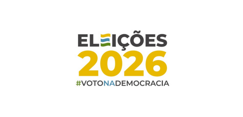 banner com fundo branco sobre o qual se observa a logomarca das Eleições 2026. São três linhas. ...