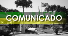 Banner com o título "Comunicado", em letras brancas, sobre uma faixa horizontal verde e amarela....