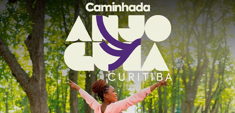 Caminhada solidária Anjo Guia acontece no dia 26 de novembro Banner em que se lê: Caminhada Anjo Guia - Curitiba. Ao fundo, há uma fotografia de uma mulher n...