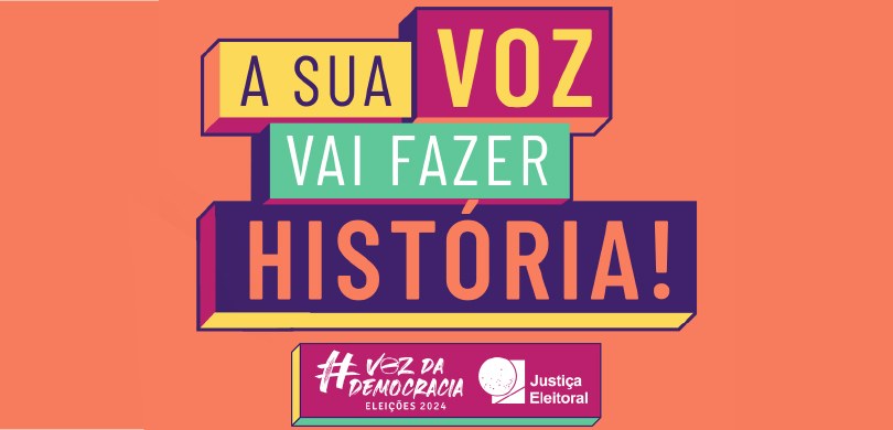 Um banner laranja, em que se lê a frase “A sua voz vai fazer história!” em letras azuis, amarela...