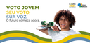 Banner com fundo branco, no qual é possível ver um homem jovem, de pele escura e cabelos cachead...