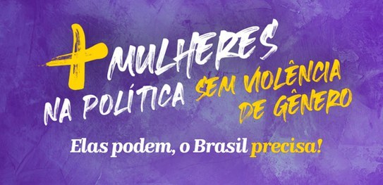 Imagem com o fundo roxo, com os escritos "+ (mais) Mulheres na política sem violência de gênero"...